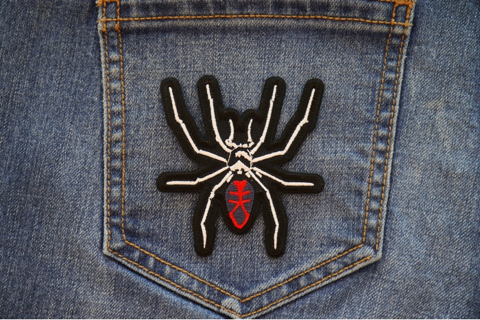 Arachnid Spider Iron on Patch shown on jeans