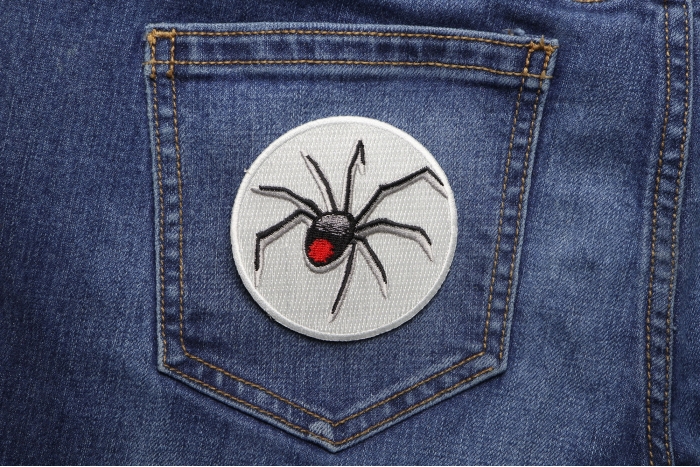 Black Widow Spider Iron on Patch shown on jeans