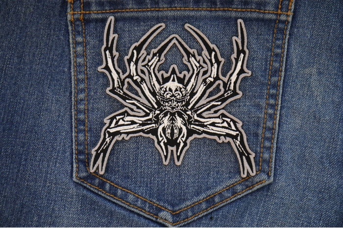 Wicked Spider Patch shown on jeans