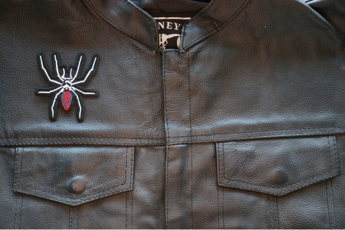 Arachnid Spider Iron on Patch shown on leather vest