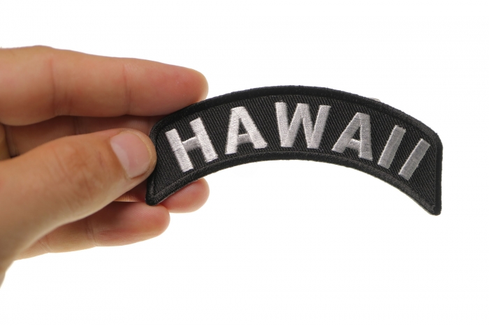 Hawaii Patch Iron on State Rocker shown on hand for size comparison