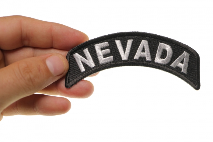 Nevada Patch Iron on State Rocker shown on hand for size comparison