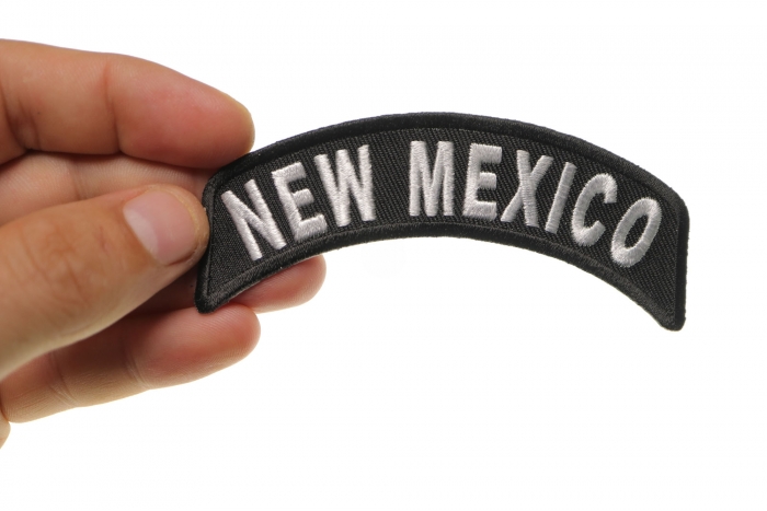 New Mexico Patch Iron on State Rocker shown on hand for size comparison