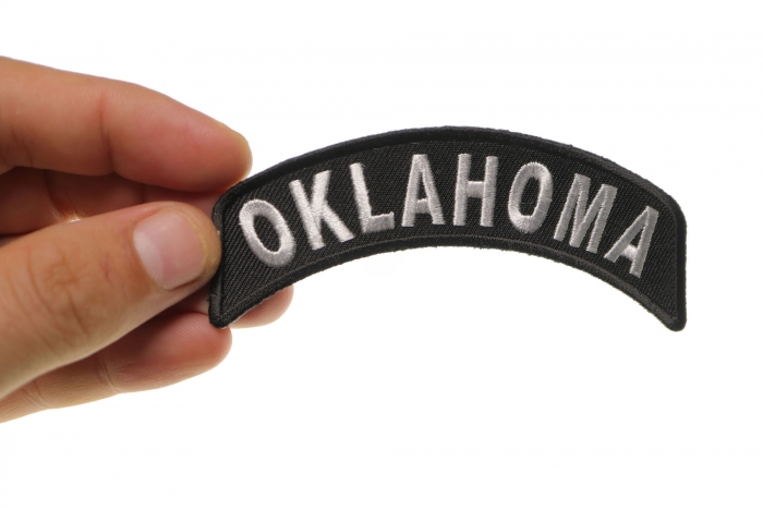 Oklahoma Patch Iron on State Rocker shown on hand for size comparison