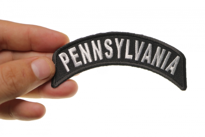 Pennsylvania Patch Iron on State Rocker shown on hand for size comparison