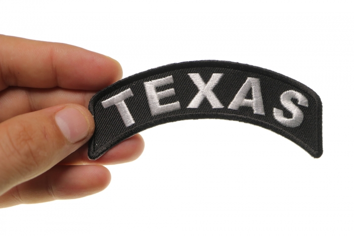 Texas Patch Iron on State Rocker shown on hand for size comparison