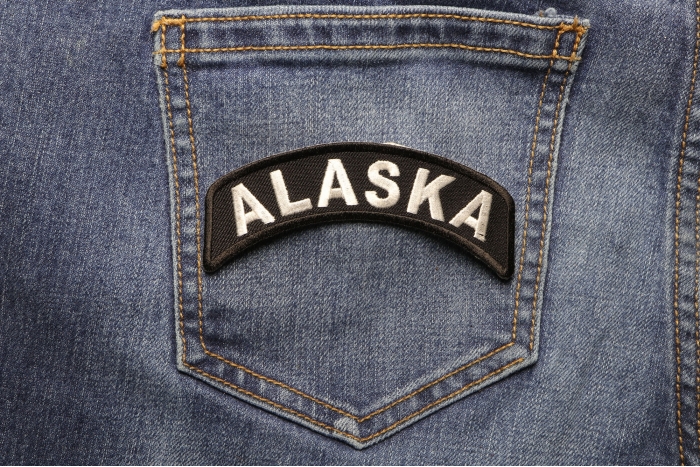 Alaska Patch Iron on State Rocker shown on jeans