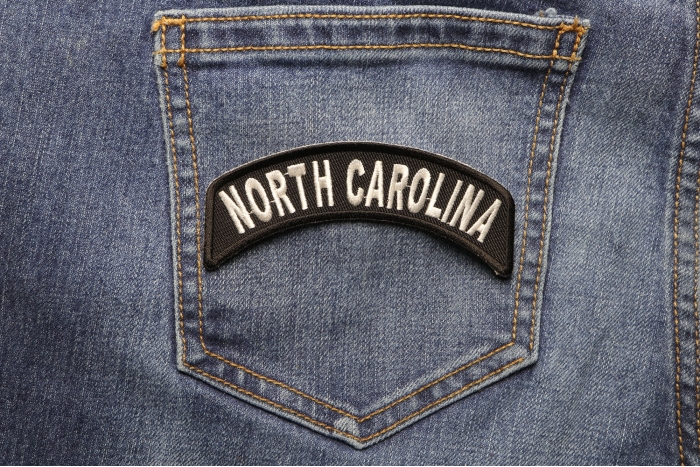 North Carolina Patch Iron on State Rocker shown on jeans