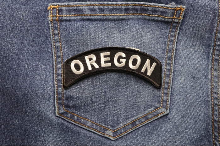 Oregon Patch Iron on State Rocker shown on jeans