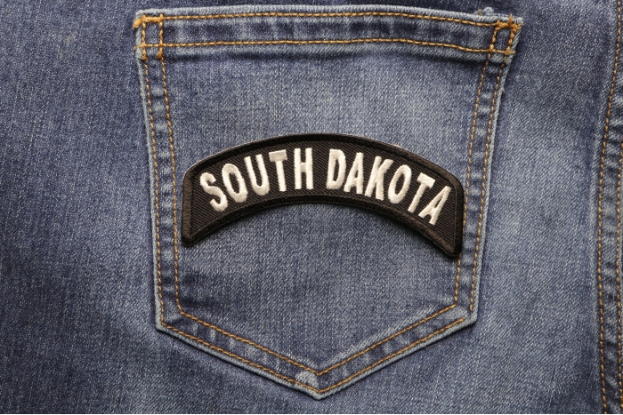 South Dakota Patch Iron on State Rocker shown on jeans
