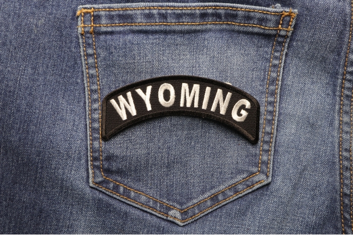 Wyoming Patch Iron on State Rocker shown on jeans