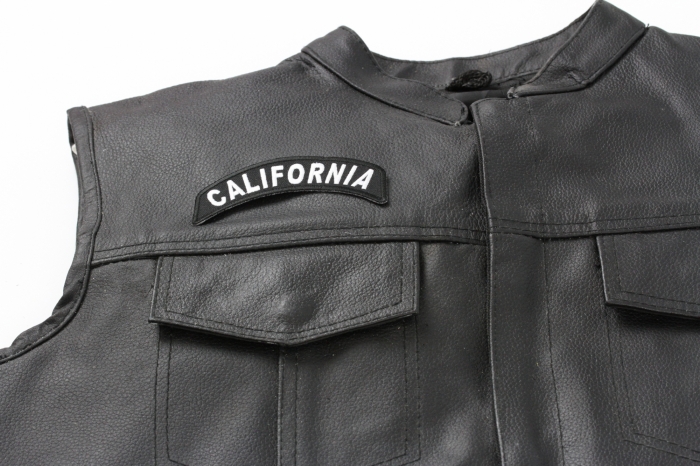 California Patch - 4x1.75 inch. Embroidered Iron on Patch shown on leather vest