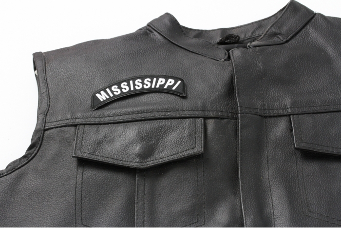 Mississippi Patch - 4x1.75 inch. Embroidered Iron on Patch shown on leather vest