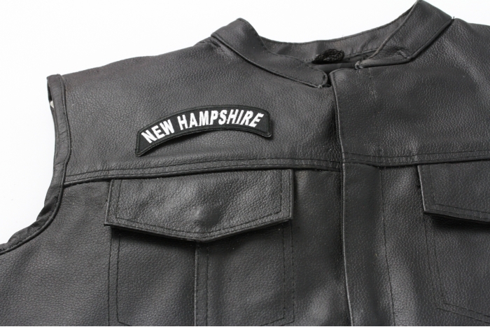 New Hampshire Patch - 4x1.75 inch. Embroidered Iron on Patch shown on leather vest