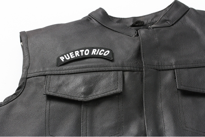 Puerto Rico Patch - 4x1.75 inch. Embroidered Iron on Patch shown on leather vest
