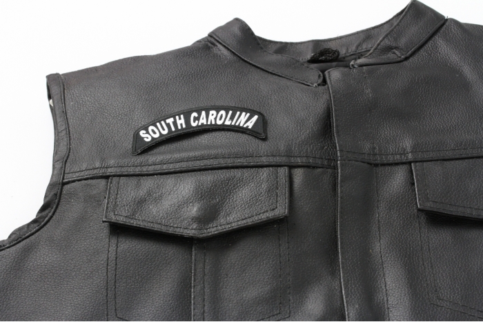 South Carolina Patch - 4x1.75 inch. Embroidered Iron on Patch shown on leather vest