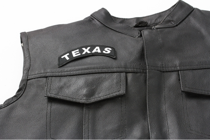 Texas Patch - 4x1.75 inch. Embroidered Iron on Patch shown on leather vest