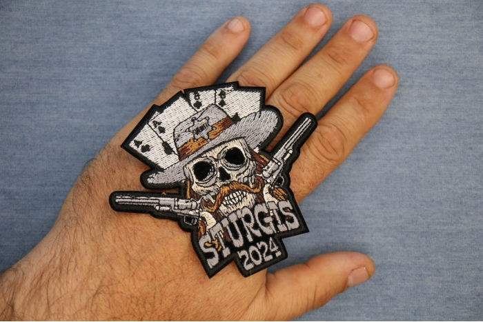 Sturgis 2024 Wild Bill Patch shown on hand for size comparison
