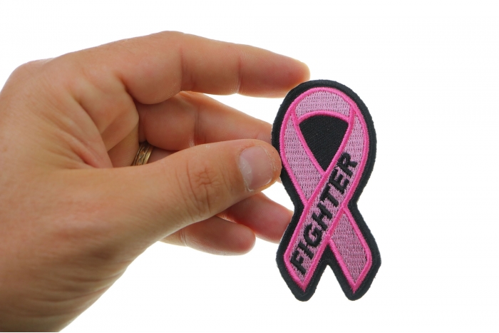 Breast Cancer Fighter Pink Ribbon Patch shown on hand for size comparison