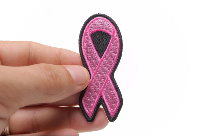 Small Pink Ribbon Breast Cancer Awareness Patch shown on hand for size comparison