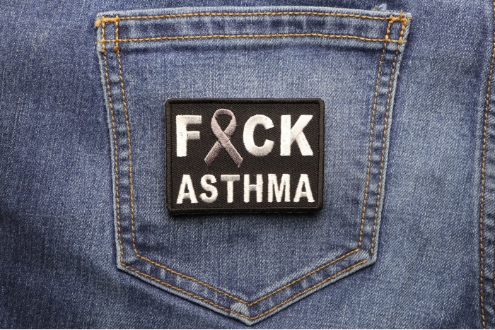FCK Asthma Gray Ribbon Patch shown on jeans