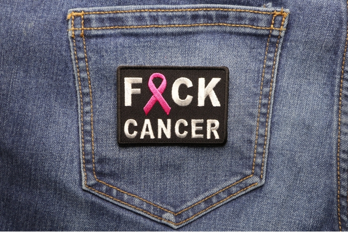 FCK Cancer Pink Ribbon Patch shown on jeans