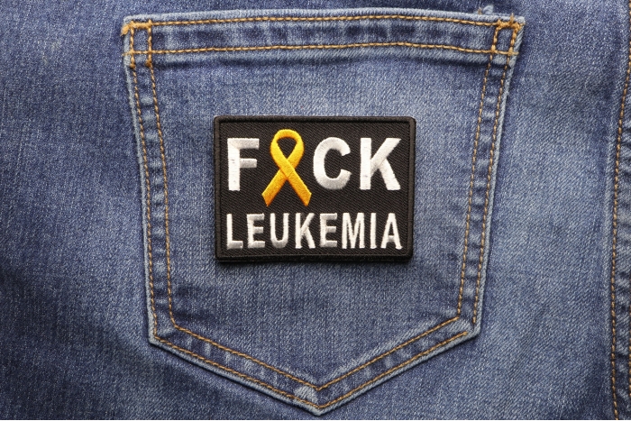 FCK Leukemia Orange Ribbon Patch shown on jeans