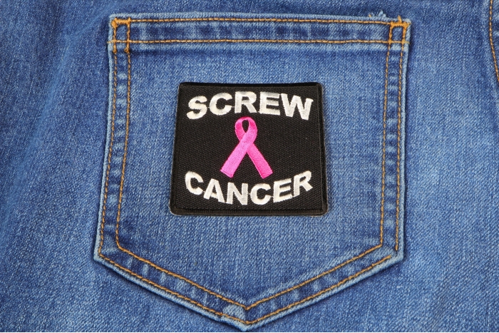 Screw Cancer Patch shown on jeans