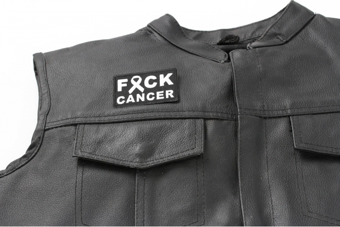 FCK Cancer White Ribbon Patch - 2.75x2 inch. Embroidered Iron on Patch shown on leather vest