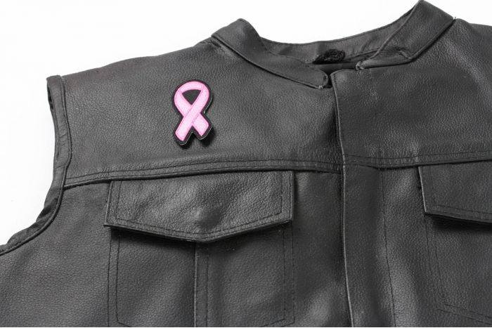 Small Pink Ribbon Breast Cancer Awareness Patch - 1.25x3 inch. Embroidered Iron on Patch shown on leather vest