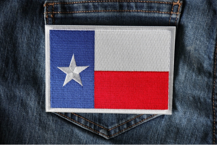 Texas Flag Iron on Patch Medium shown on jeans