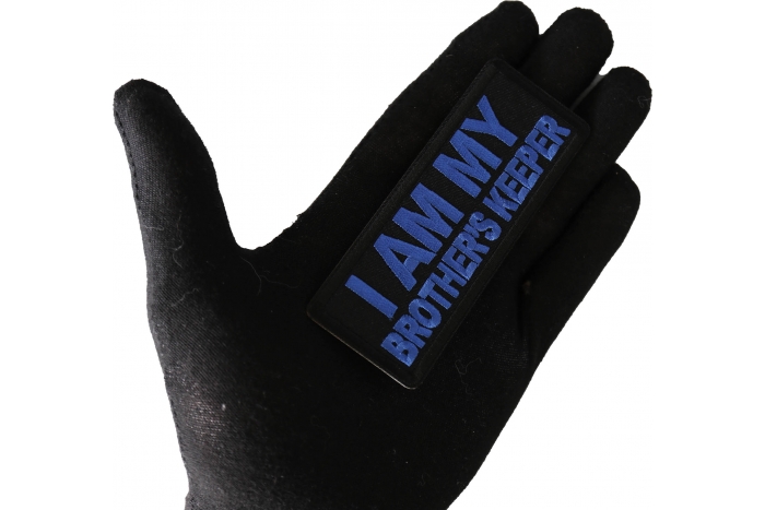 I am My Brother's Keeper Patch Blue shown on hand for size comparison