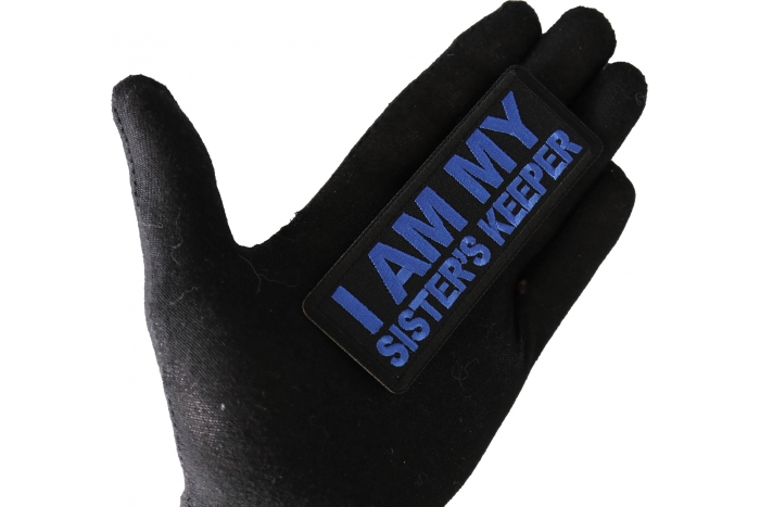I am My Sister's Keep Patch Blue shown on hand for size comparison