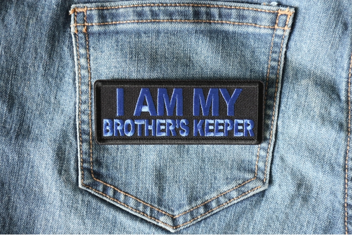 I am My Brother's Keeper Patch Blue shown on jeans