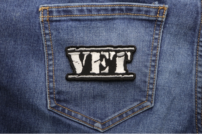 Vet Patch Old Stamper White shown on jeans