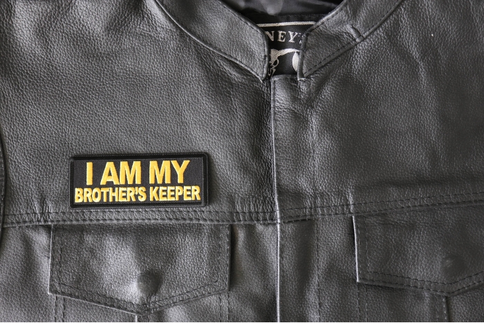 I am My Brother's Keep Patch Yellow - 4x1.5 inch - Embroidered Iron on Patch shown on leather vest