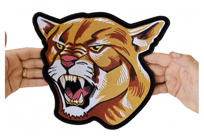 Cougar Patch, Large Animal Patches for Jackets shown on hand for size comparison