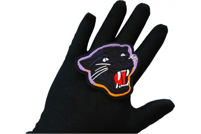 Jaguar Iron on Patch shown on hand for size comparison