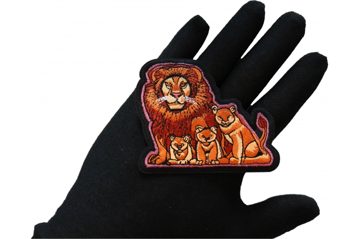 Lion and Cubs Patch shown on hand for size comparison