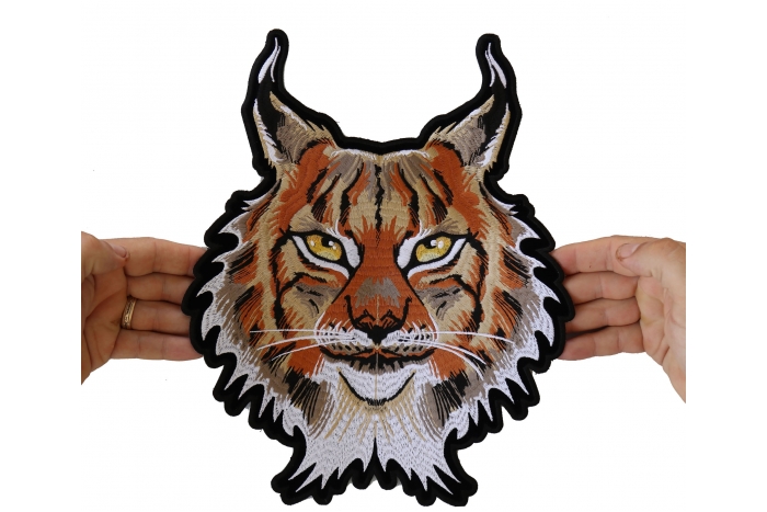 Lynx Cat Patch, Large Animal Patches for Jackets shown on hand for size comparison