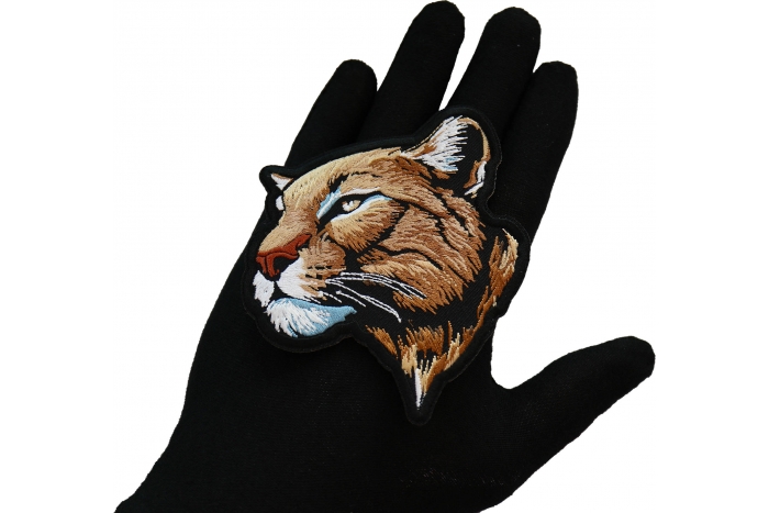 Thinking Mountain Lion Patch shown on hand for size comparison