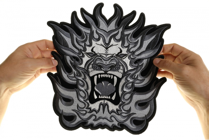 Tribal Lion Patch, Large Animal Patches for Jackets shown on hand for size comparison