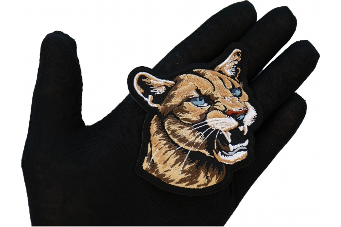 Vicious Cougar Patch shown on hand for size comparison