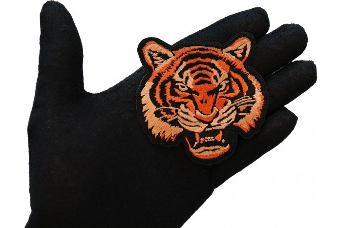 Vicious Tiger Iron on Patch shown on hand for size comparison