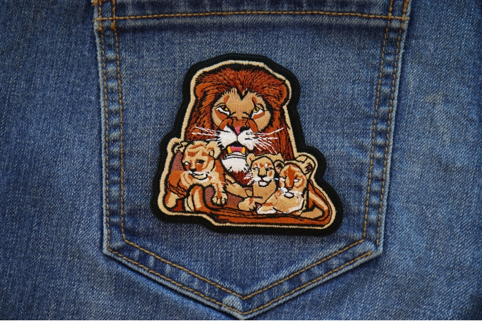 Lion and Babies Iron on Patch shown on jeans