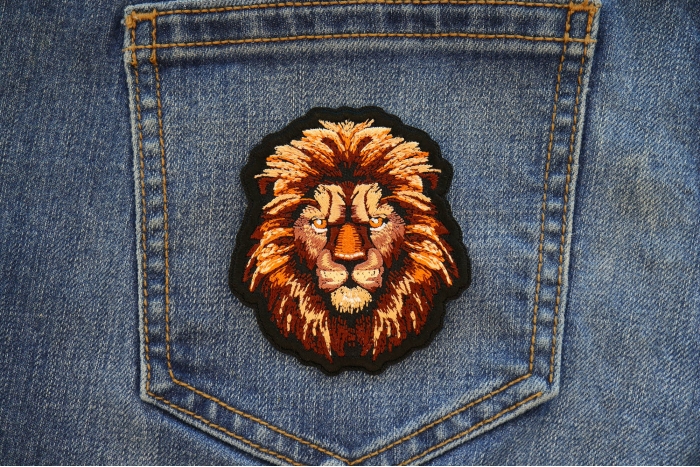 Lion with a Stare Patch shown on jeans