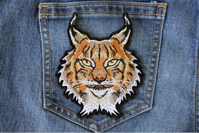 Lynx Cat Small Patch shown on jeans