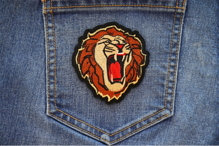 Male Lion Iron on Patch shown on jeans