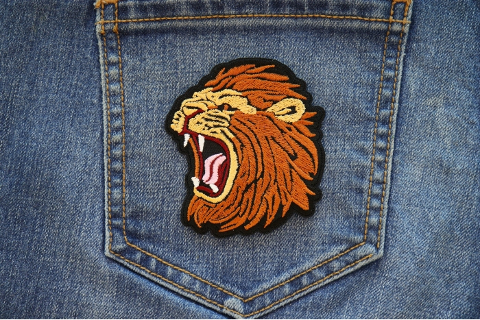 Screaming Lion Iron on Patch shown on jeans