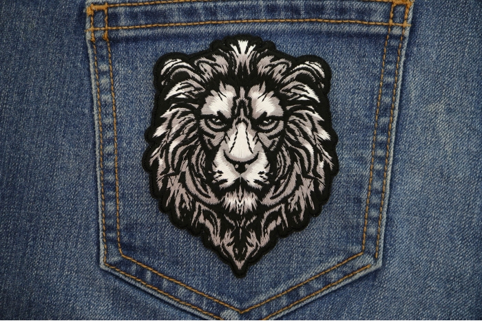 Silver Lion Patch shown on jeans